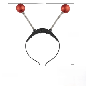 Detail of red glitter eyeball headband with silver spring coils and 11-inch dimensions