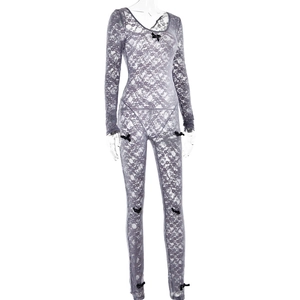 Detailed view of grey sheer lace bodysuit featuring black bow accents and long sleeves
