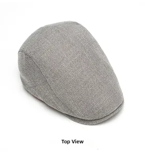 Vue de dessus montrant la texture tissée grise respirante de cette casquette plate