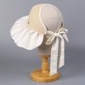 Chapeau de soleil pour femme avec large bord et nœud élégant pour protection UV