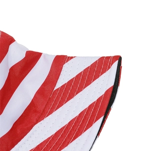 Detail of red and white striped bucket hat with black piping and high-quality stitching