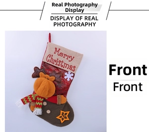 Close-up of 3D reindeer Christmas stocking with Merry Christmas embroidery and rustic cuff