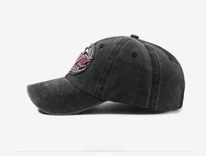 Detail of vintage washed baseball cap with distressed texture and circular embroidered patch