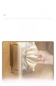 Detail of wall-mounted acrylic tissue box with U-shaped opening for easy paper extraction