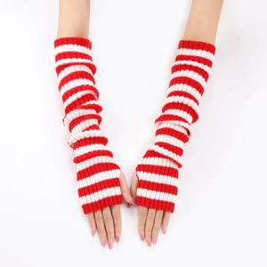 Detail of red and white striped knitted arm warmers with thumb holes on model