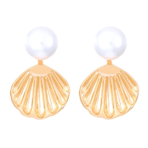 Detailed view of elegant gold scallop shell stud earrings with central white pearls