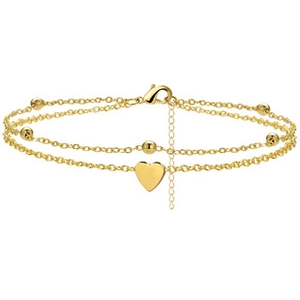 Detail of layered gold beaded chain with polished heart pendant and secure lobster clasp