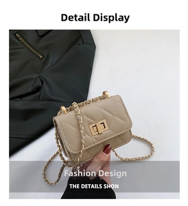 Detail shot of beige quilted cross-body bag featuring a gold metal twist lock and chain strap
