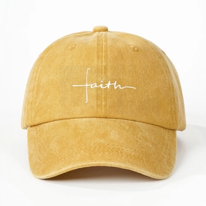 Unisex washed cotton baseball cap in mustard yellow featuring a white faith embroidery