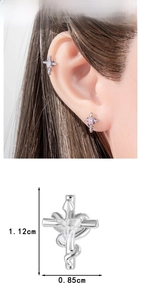 Detailed view of silver cross earring with pink heart zircon and size dimensions