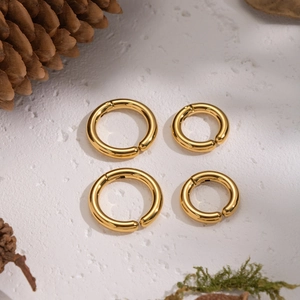 Minimalist 18K gold stainless steel non-pierced ear clips in two sizes on white background