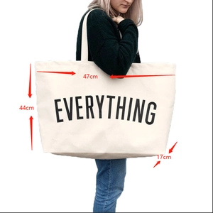 Large beige canvas tote bag with Everything print, dimensions 47x44x17cm for travel