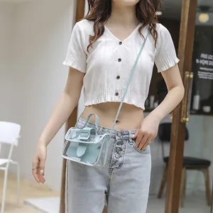 Mini mint green transparent PVC jelly crossbody bag with inner pouch and adjustable strap