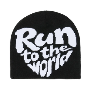 Detailed view of knitted beanie featuring heart-shaped Run to the World jacquard text
