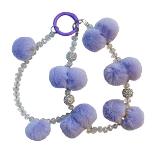 Purple beaded phone chain with soft faux fur pompoms and crystal accents for bags