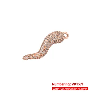 Detailed view of chili pendant measuring 22mm length and 6mm width with clear gemstones