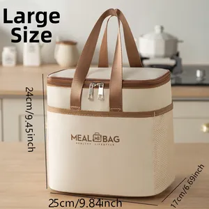 Detailed view of cream canvas lunch bag with side mesh pocket and thermal insulation