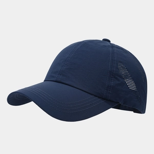 Detailed view of dark blue breathable baseball cap with laser-cut ventilation holes