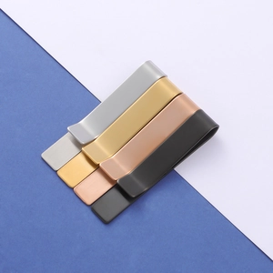 Detailed view of matte brushed metal tie clips in silver, gold, rose gold and black colors