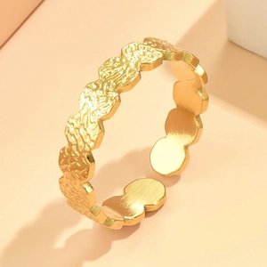 Vintage golden stainless steel open ring with hammered texture and scalloped wavy edges