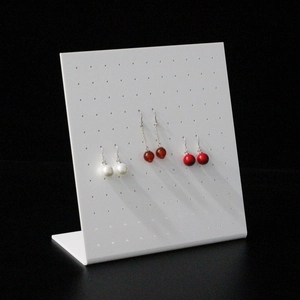 L-shape white acrylic earring display stand with multiple holes for jewelry storage