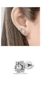 Detail view of pearl and diamond ear stud with 0.64cm size dimension measurement