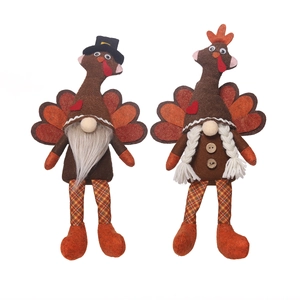 Pair of Thanksgiving harvest turkey gnomes with autumn colors and striped legs on white background