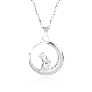 Polished silver stainless steel pendant featuring a rabbit inside a crescent moon