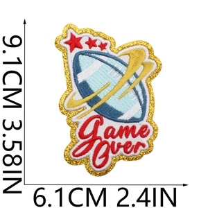 Detail view of Game Over football patch with gold sequins and 9.1cm size markings