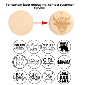 Detailed laser engraving on round wooden charms featuring artistic Mom and Mama theme designs