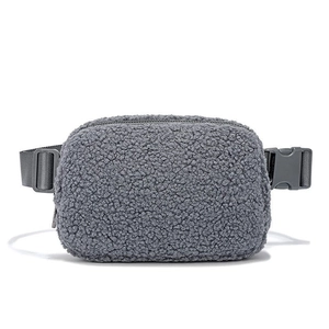 Fleece waist bag in grey with adjustable strap and buckle on a white background