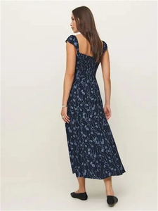 Elegant floral print midi dress in navy blue with a smocked back and flutter sleeves