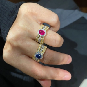 Italian style lace gold ring set with red ruby and blue sapphire oval gemstones
