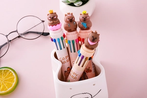Macro view of Capybara 10-color ballpoint pen with cute 3D topper for students