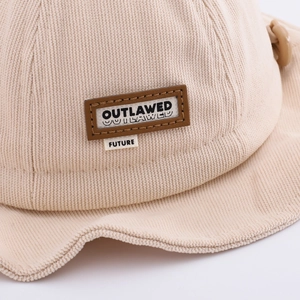 Beige corduroy bucket hat for kids with cute bunny ears and soft autumn texture