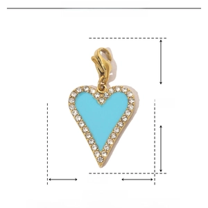Detail of blue enamel heart pendant with rhinestones showing 31mm height and 16mm width