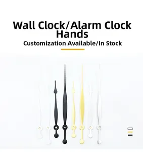 Macro detail of various quartz clock hands in black, gold, and silver metal finish