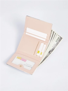 Internal layout of pink bi-fold wallet showing multiple card slots and clear ID window