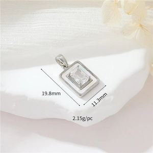 Detail view of oval zirconia pendant with shell inlay showing dimensions 19.8mm by 11.3mm