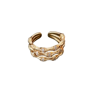 Gold bamboo-style triple layer open ring with white cubic zirconia accents for women
