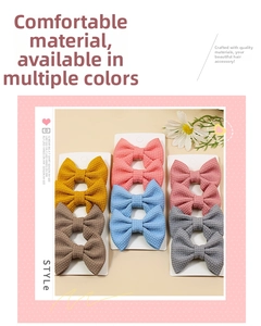 Detail of 8-piece waffle knit bow hair clips set on display card with daisy decor