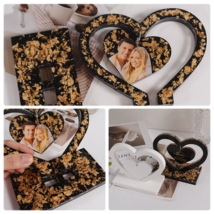 DIY heart-shaped resin photo frame silicone mold with rotating charms and gold foil design