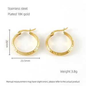 Detail of 26mm 18K gold plated stainless steel hoop earrings with Greek key pattern