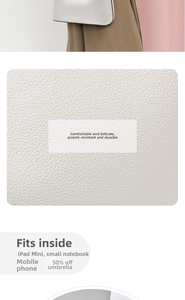 Detail of lychee textured leather bucket bag showing large capacity for iPad mini and phone