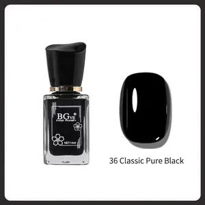 Close-up of 14ml BGVE classic pure black nail polish bottle and glossy finish swatch