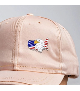 Macro detail of USA map and eagle badge with flag pattern on a pink baseball cap