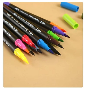 Detail of dual-tip watercolor markers with soft brush tips in vibrant assorted colors
