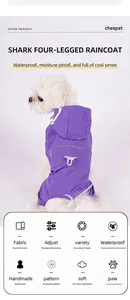 Detail of purple waterproof dog raincoat with transparent hood brim and adjustable drawstring