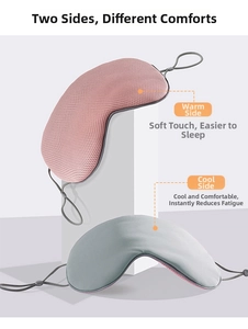 Close-up of double-sided sleep mask with pink warm mesh and grey cool silk texture