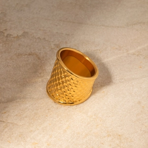 Detailed view of wide 18k gold stainless steel ring with unique fish scale texture